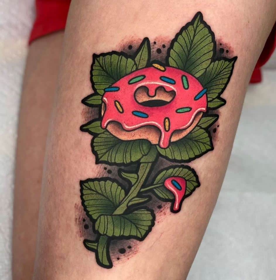 25 idee di tatuaggio a ciambella per l'inchiostro più carino di sempre