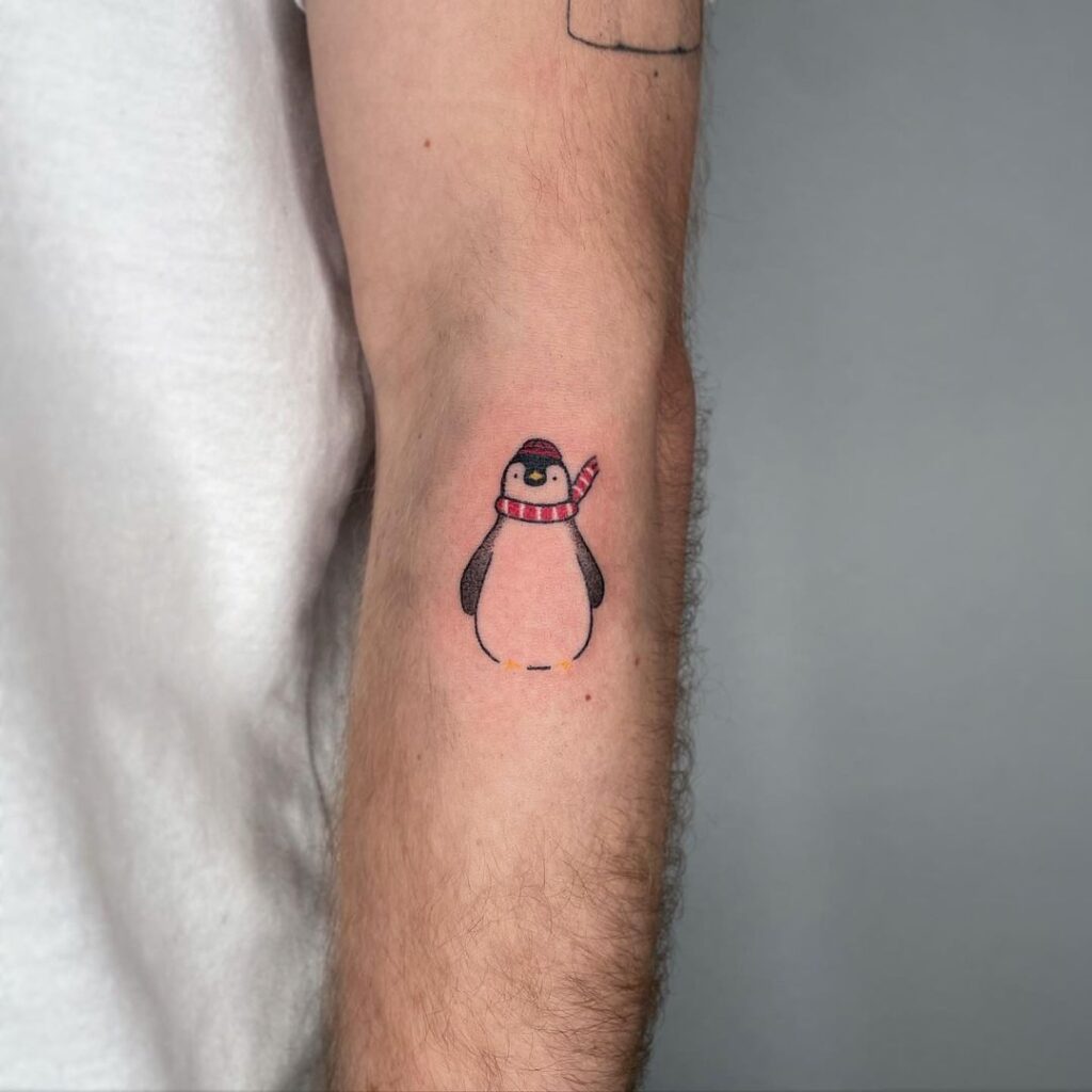 30 idées de tatouages de pingouins qui sont exceptionnellement adorables