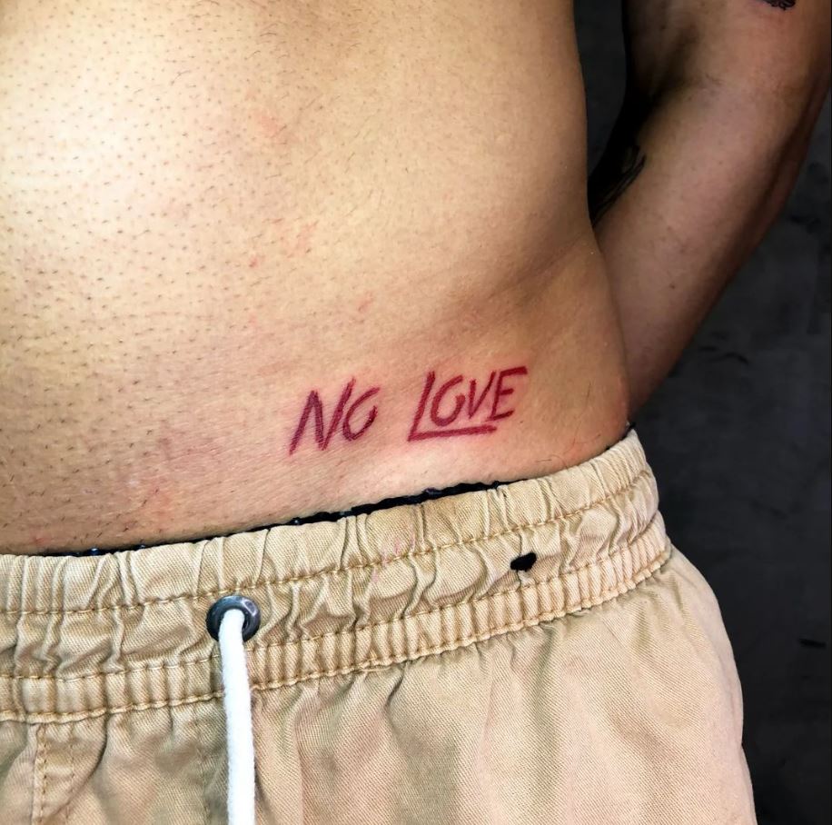 20 idee di tatuaggio senza amore per segnare tutte le rotture di cuore