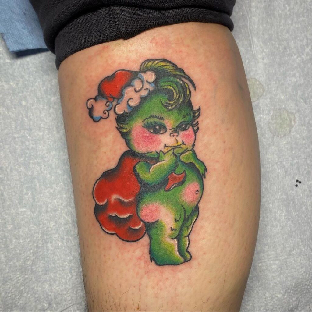 21 melhores ideias de tatuagens do Grinch para entrar no espírito natalício
