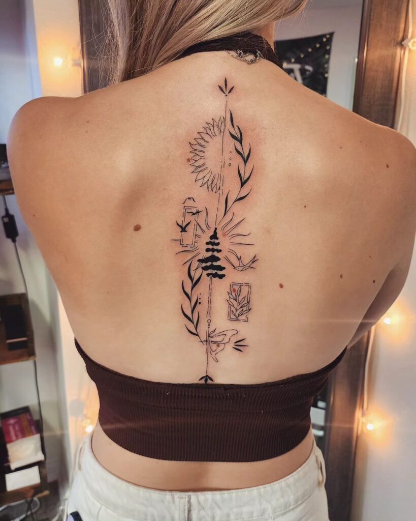 24 Cute Spine Tattoos That Are "Ink-credibly" Trendy