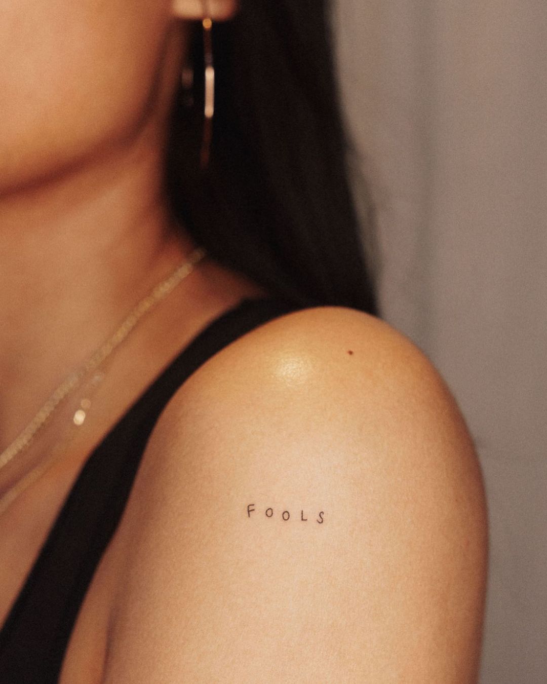 26 One-Word Tattoos That Attest To The Power Of Simplicity