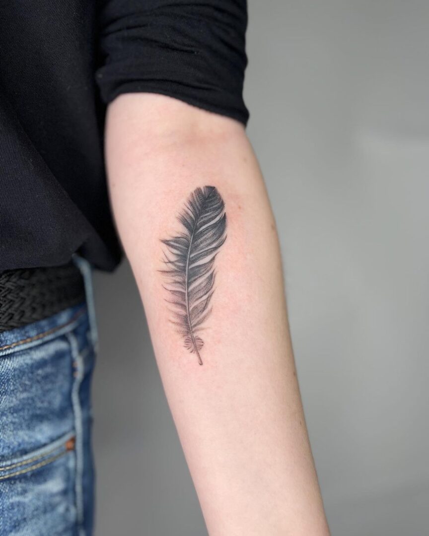 Simple And Symbolic 24 Feather Tattoo Ideas To Inspire You