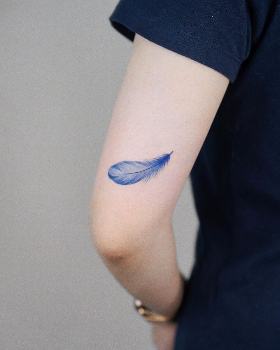 Simple And Symbolic, 24 Feather Tattoo Ideas To Inspire You