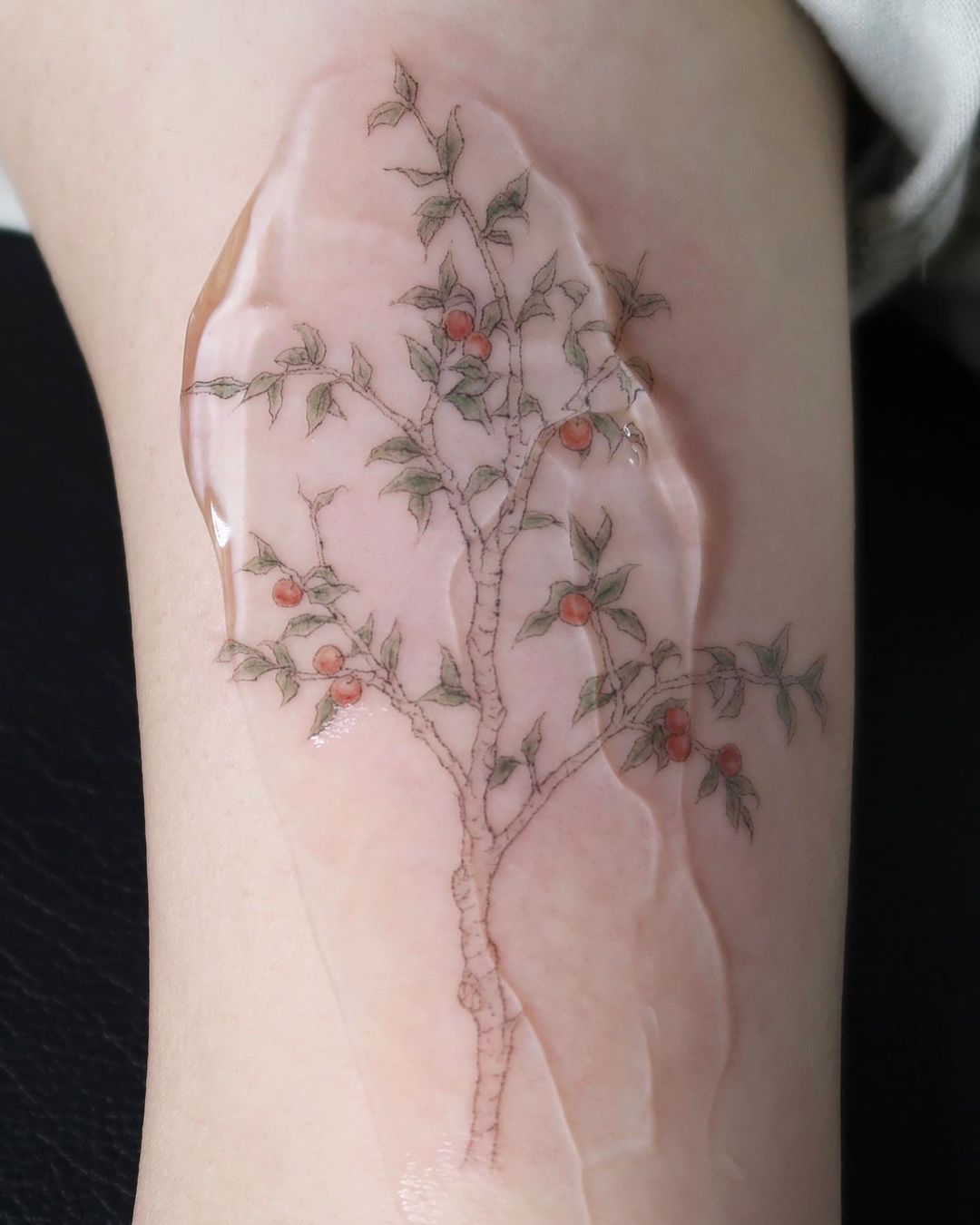 22 Seriously Appealing Apple Tree Tattoos For Your Next Ink