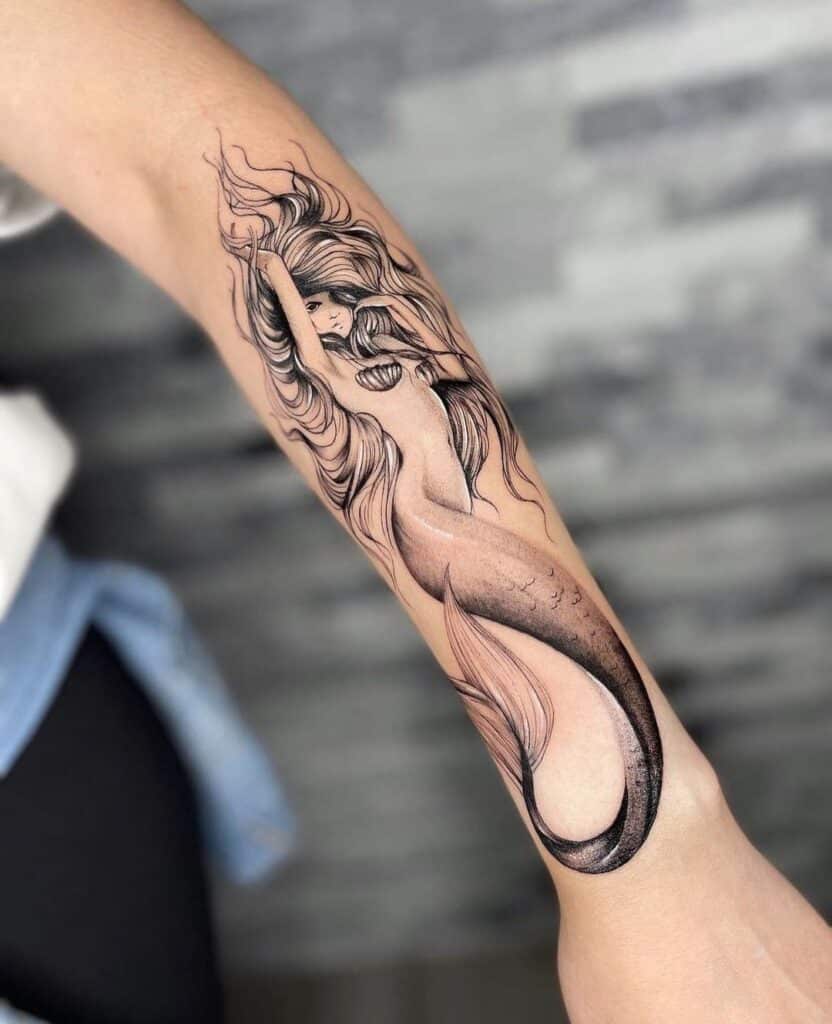 24 Meerjungfrauen-Tattoos, die Sie in die Welt der Tinte eintauchen lassen