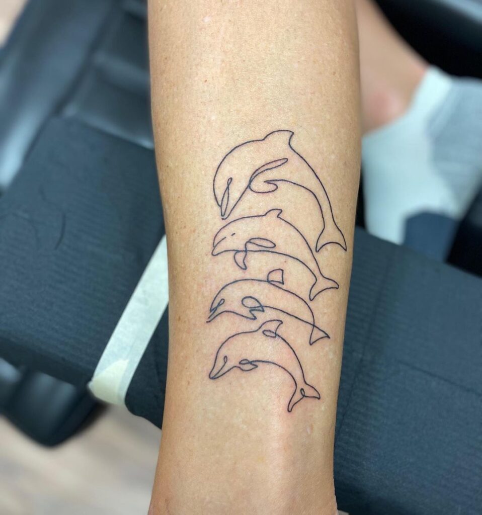 20 idées de tatouage de dauphin ludique comme cet animal