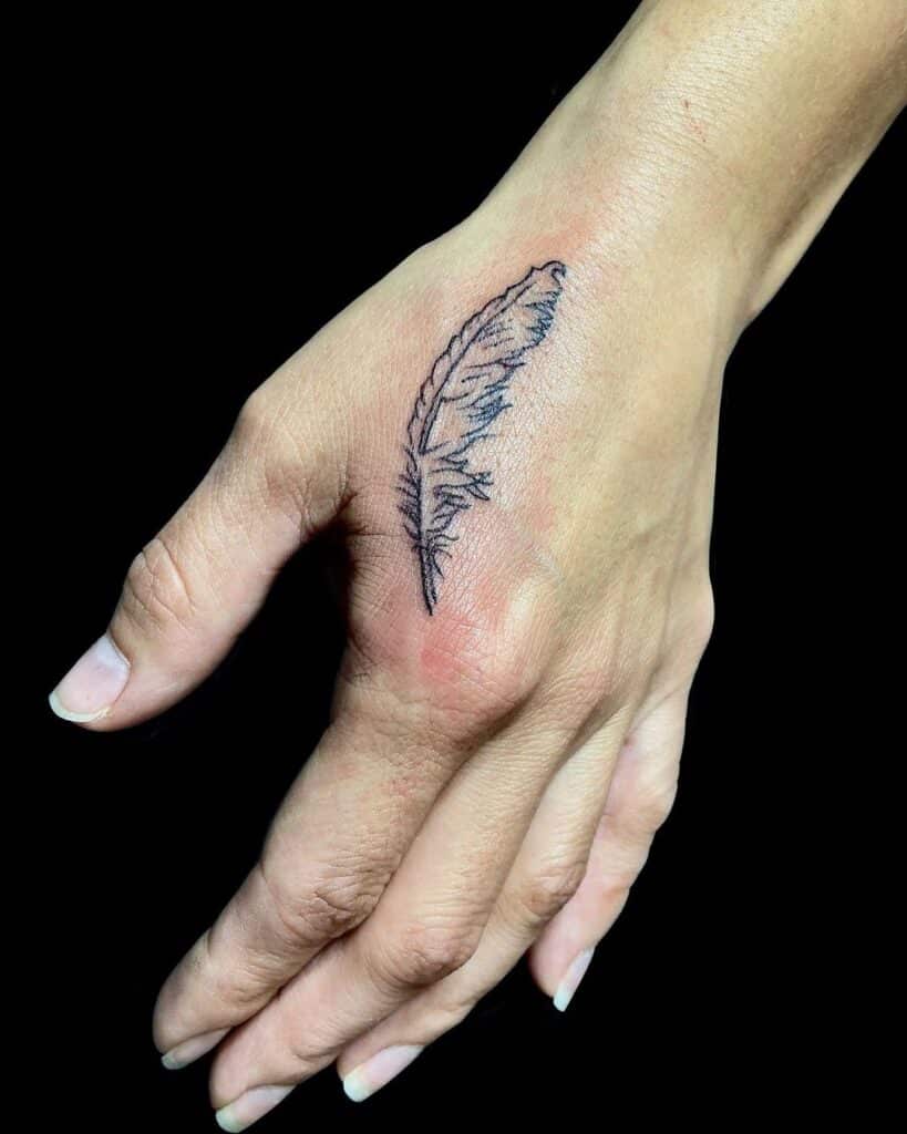 18 Elite Feather On Hand Tattoos: Handy Symbols Of Freedom