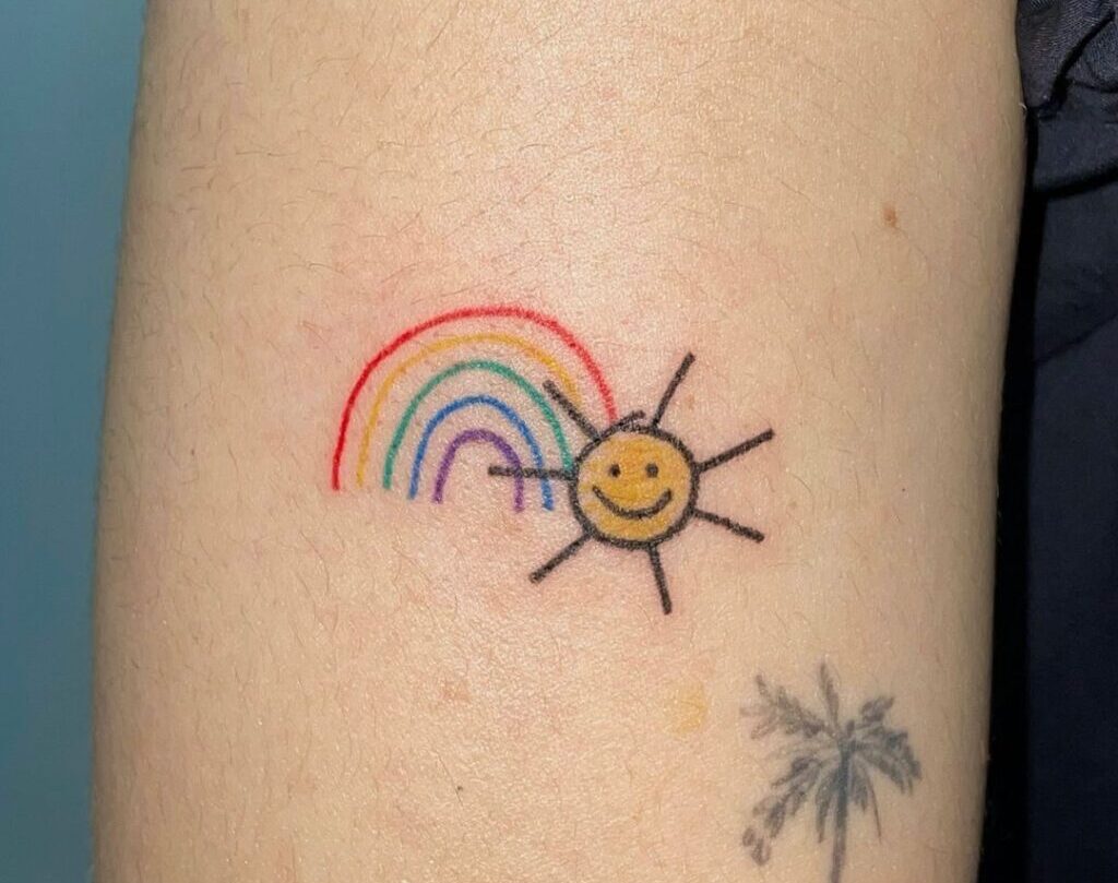 23 idées de tatouage arc-en-ciel radieux qui vous impressionneront