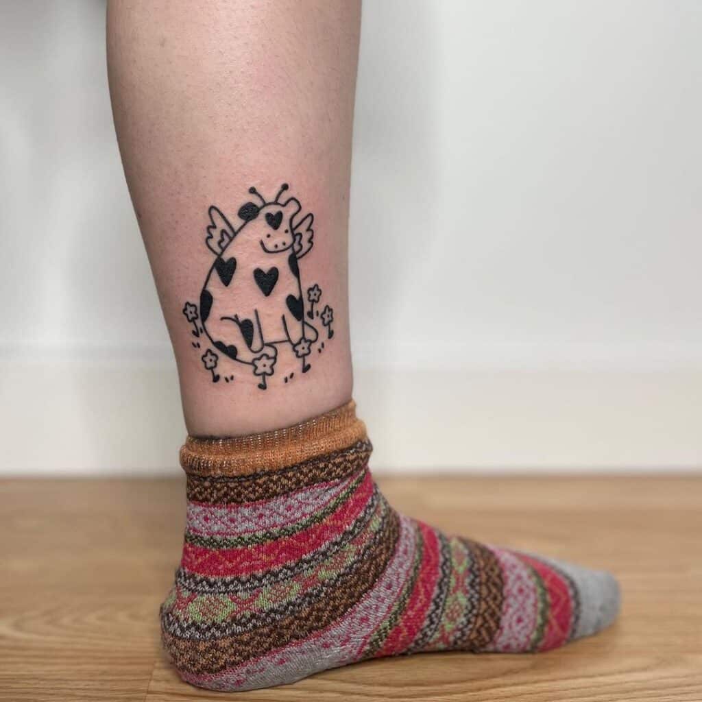 21 Incredible Cow Tattoos That'll Make You Spit Up Your Milk