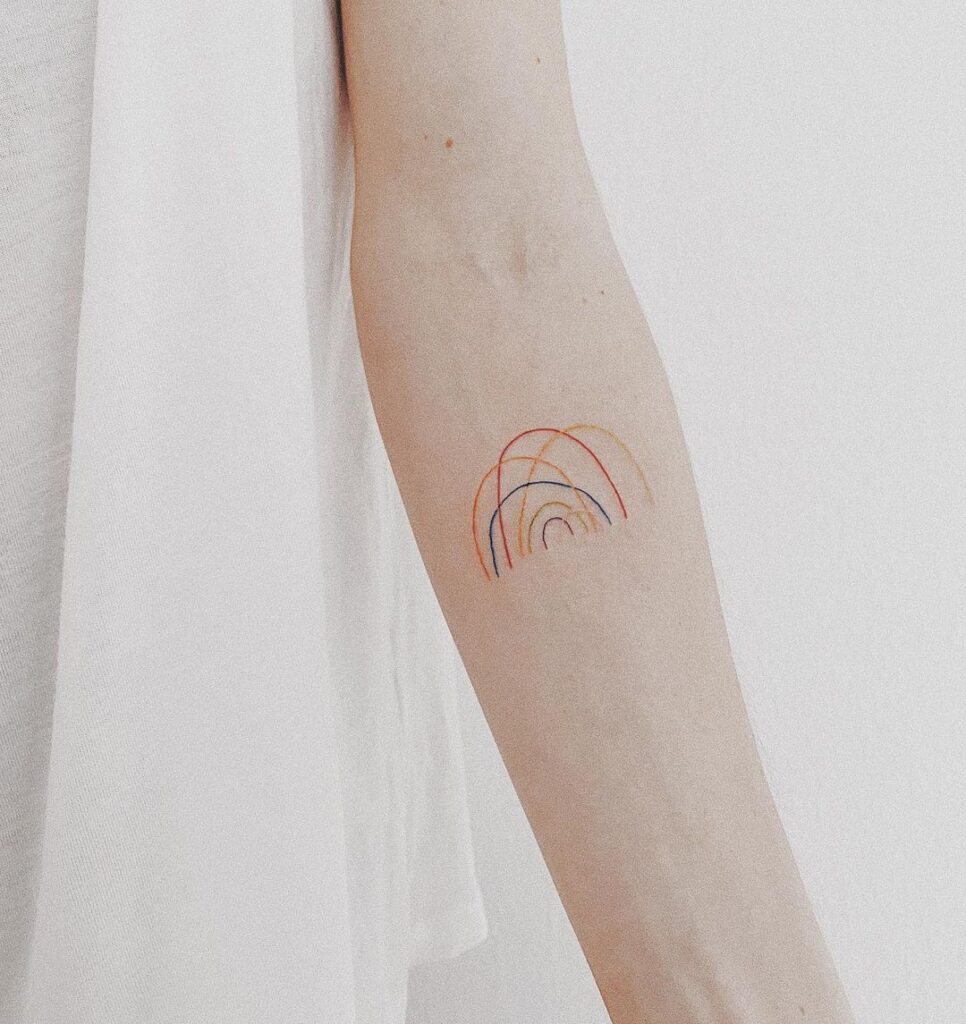 23 ideas de tatuajes arco iris que te dejarán impresionado