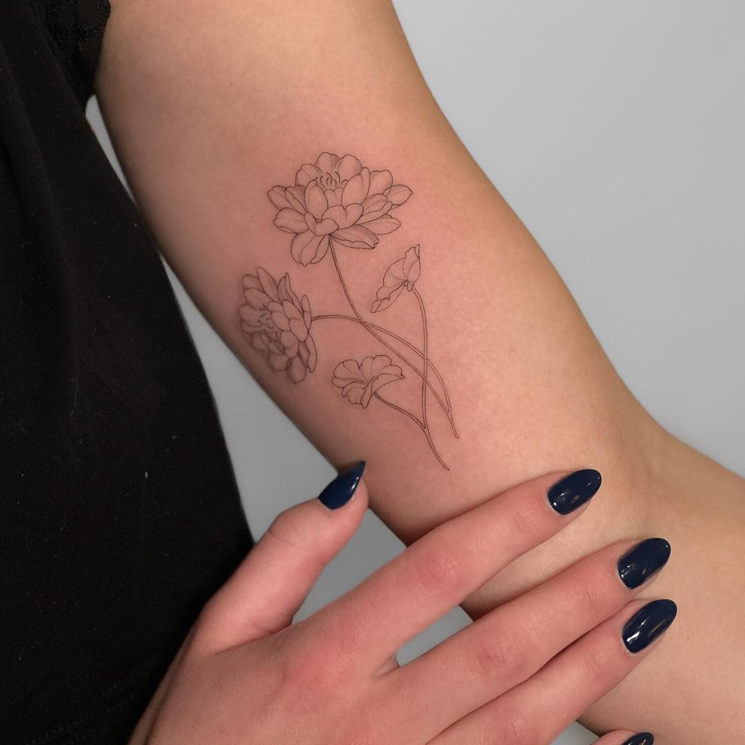 25 Enthralling Water Lily Tattoos For A Splash Of Elegance