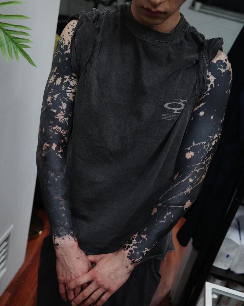 22 Black Sleeve Tattoos To Rock The Macro Ink Trends