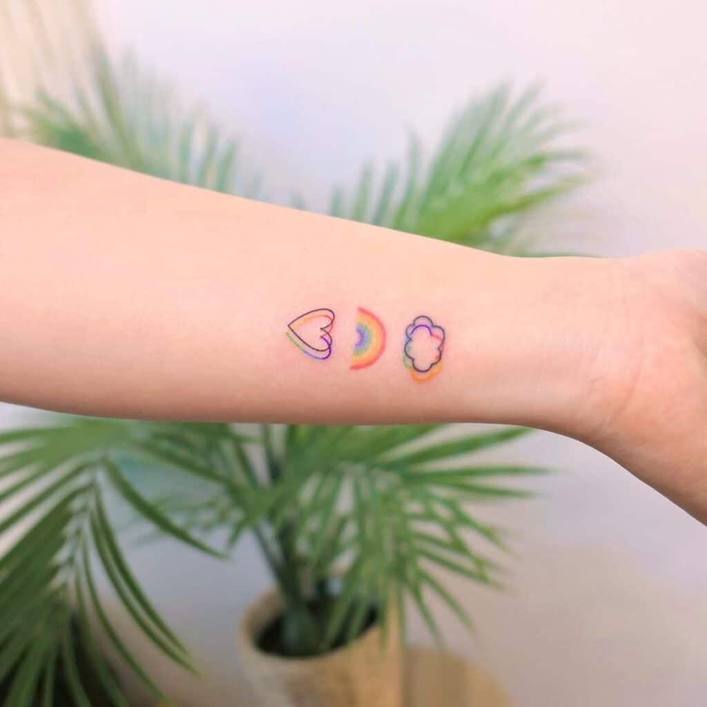 23 Strahlende Regenbogen-Tattoo-Ideen, die Sie beeindrucken werden