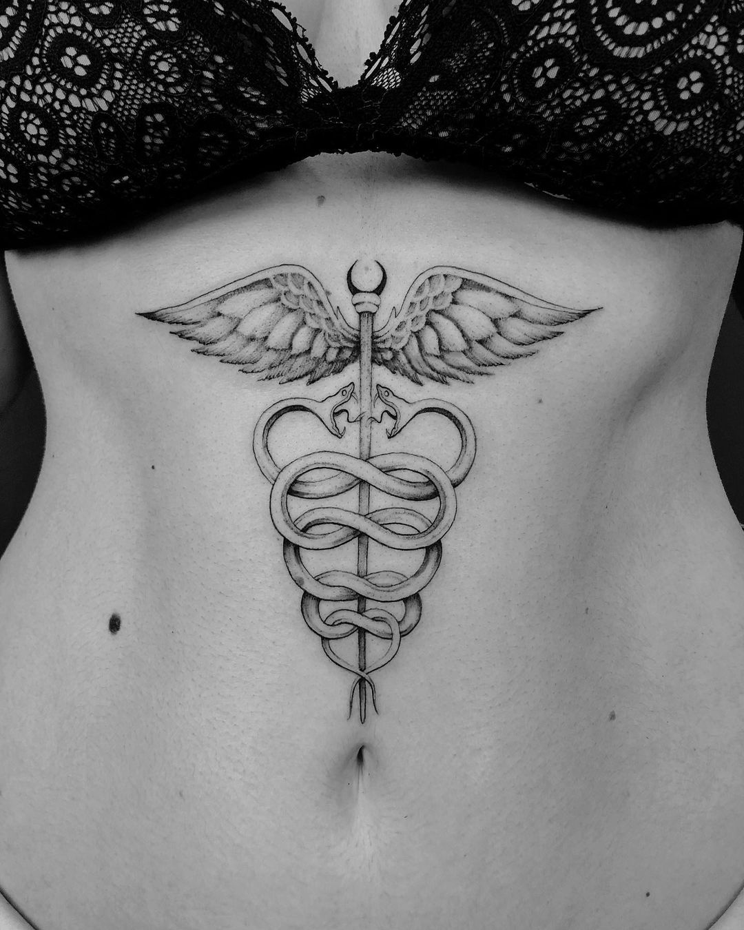 21 Superior Caduceus Tattoo Ideas You ll Want To Get Inked terracotta-anatomical-votive-comparative-guts