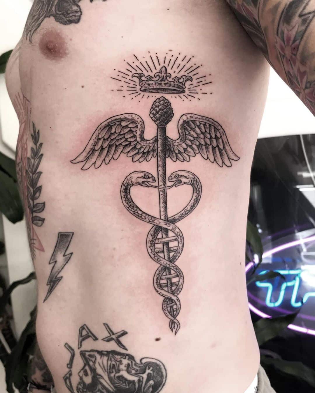 21 Superior Caduceus Tattoo Ideas You'll Want To Get Inked