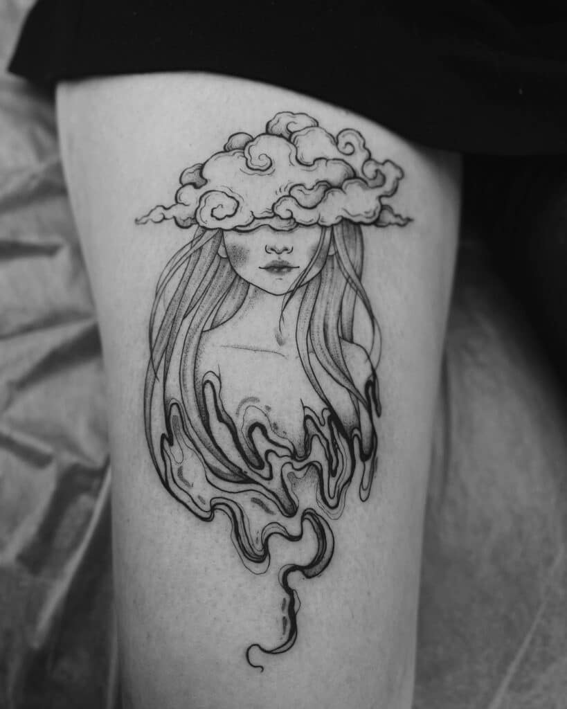 21 idées uniques de tatouage de nuages qui prouvent que le ciel est la limite