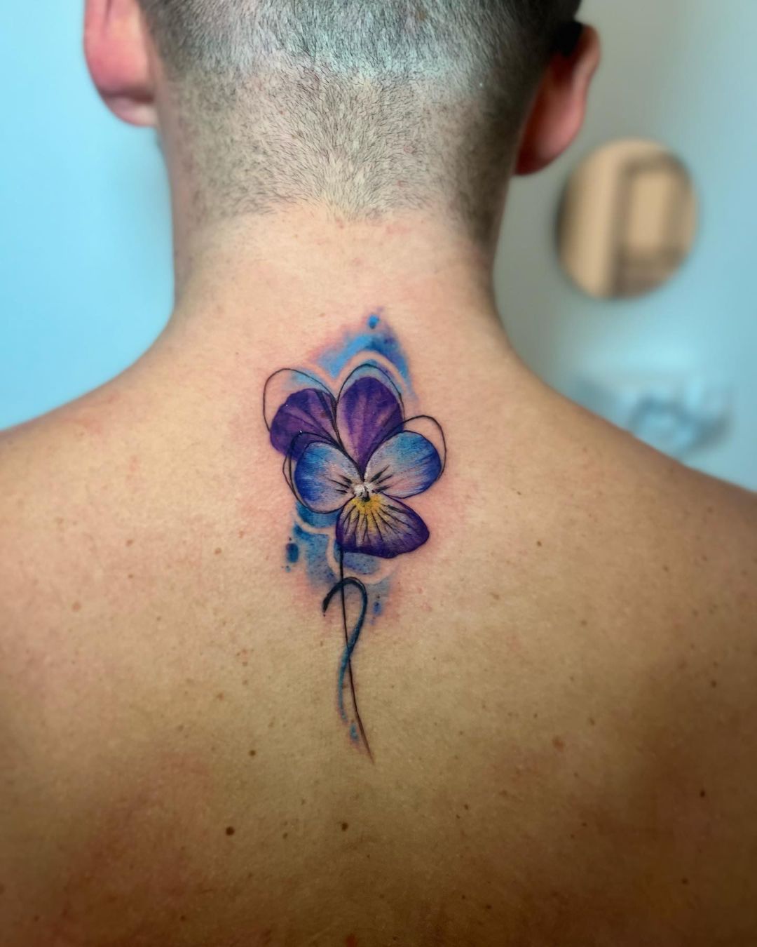 21 Alluring Violet Flower Tattoos For A Delicate Expression
