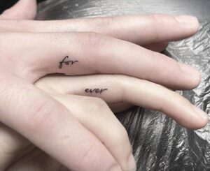 20 Attractive Finger Tattoos With Words For Tales On Skin