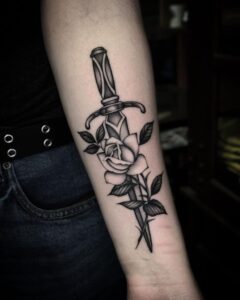 Rose With Dagger Tattoo Meaning And 20 Thrilling Ink Designs