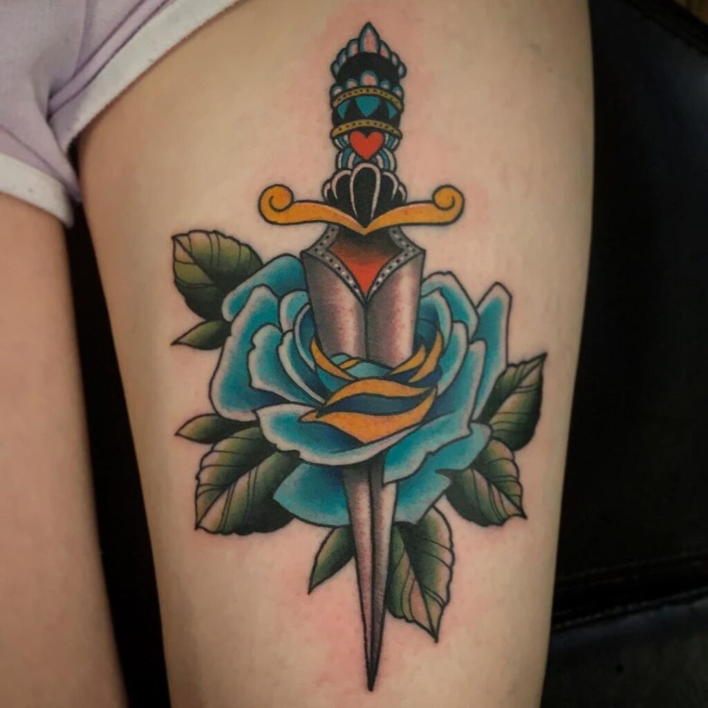 Rose With Dagger Tattoo Meaning And 20 Thrilling Ink Designs