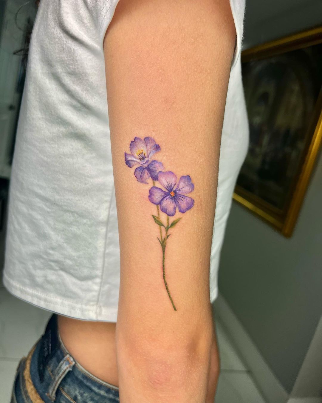 21 Alluring Violet Flower Tattoos For A Delicate Expression