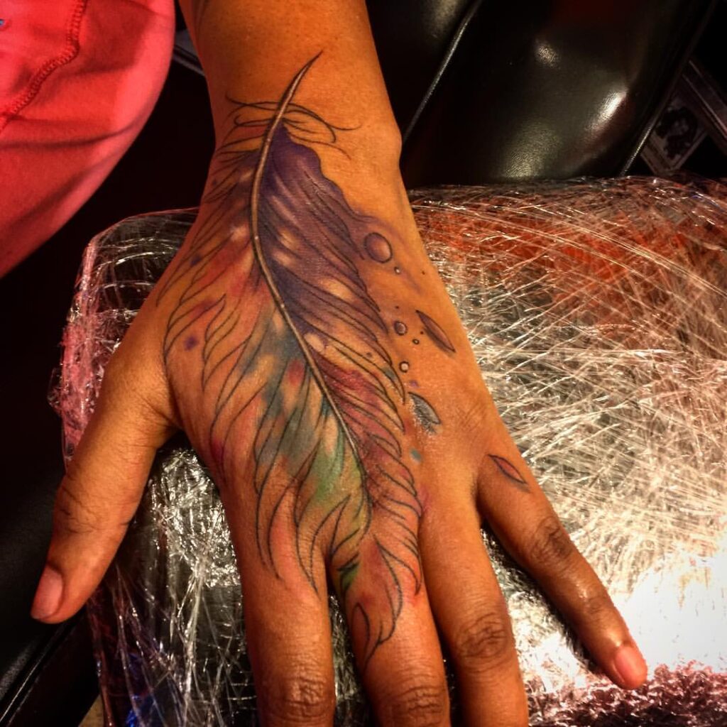 18 Elite Feather On Hand Tattoos: Handy Symbols Of Freedom