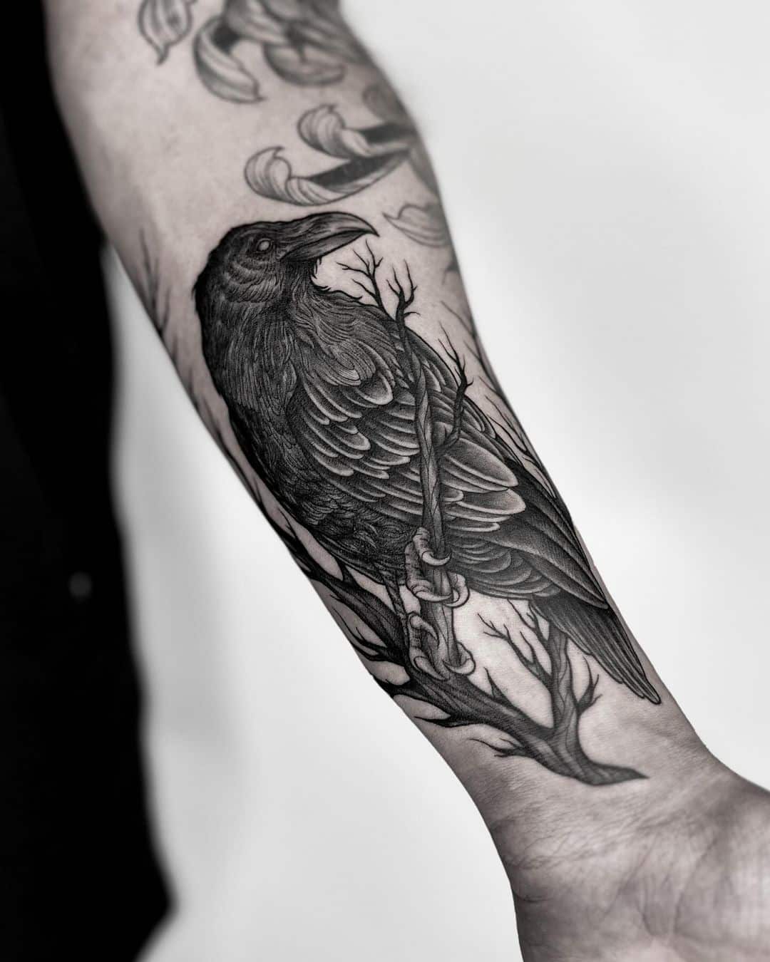 22 Protective Crow Tattoos To Help You Through Challenging Times