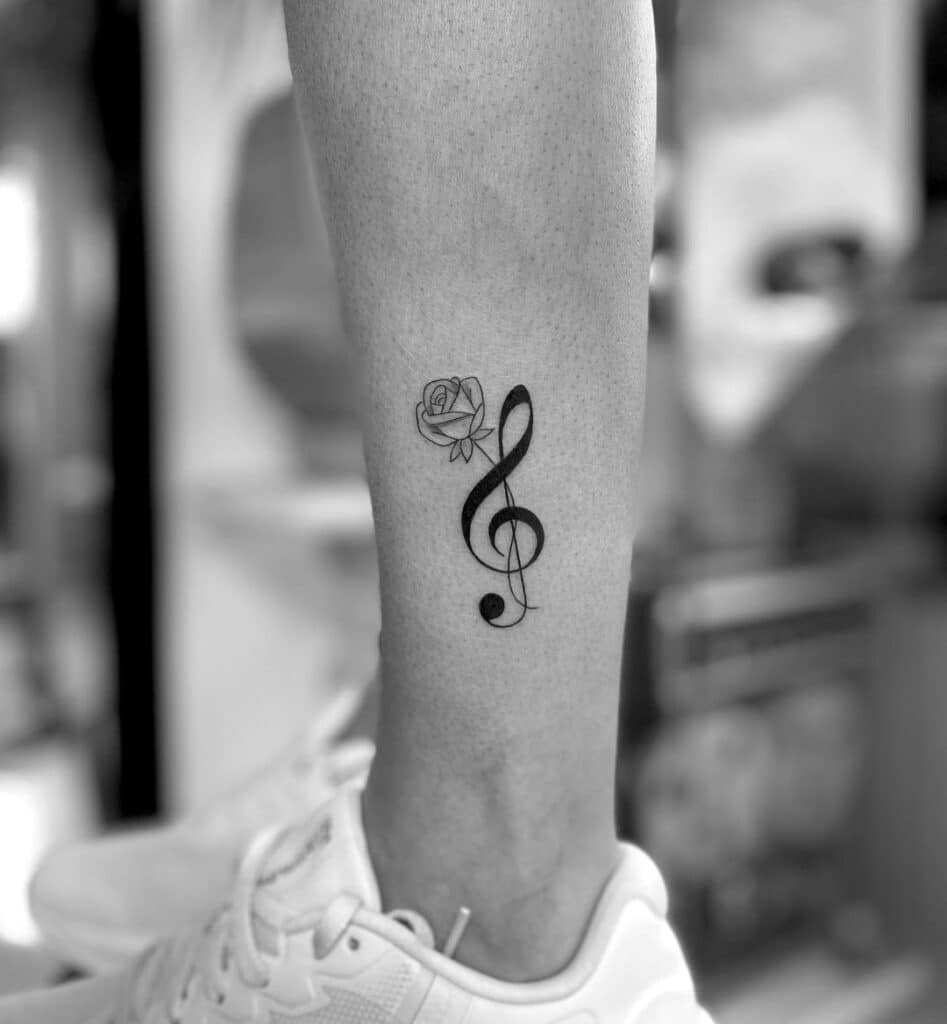21 Mind-Blowing Music Tattoos That'll Hit The Right Notes