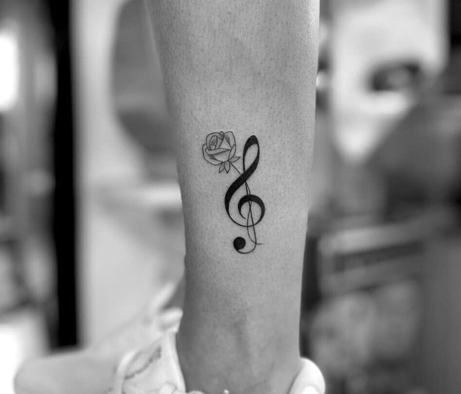 21 Mind-Blowing Music Tattoos That'll Hit The Right Notes