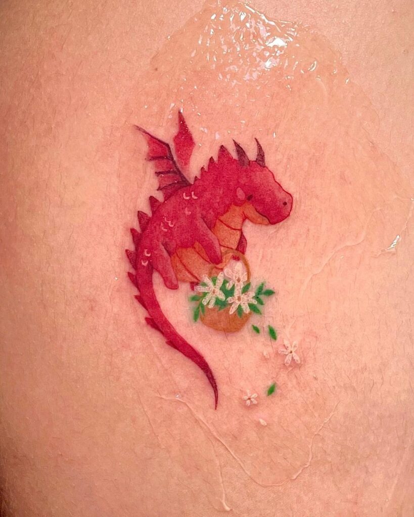 20 idées épiques de tatouage de dragon rouge qui vous obséderont